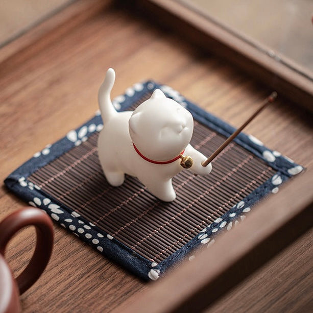 cat-shaped ceramic incense holder with an adorable design, ideal for home decor and relaxation rituals.