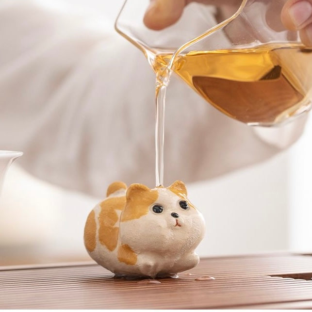 Handcrafted Corgi dog tea pet made from Yixing purple clay, ideal for tea ceremonies and traditional teaware collections.