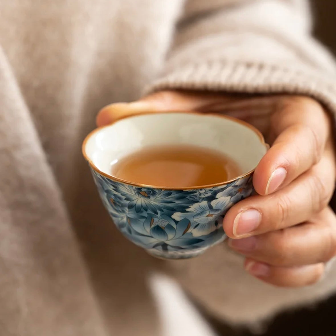 Blue Floral Chinese Tea Cup, tea in the cup, Ceramic Teaware