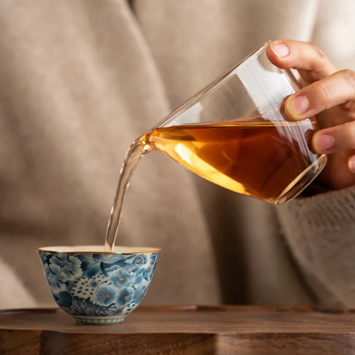 Blue Floral Chinese Tea Cup, pouring tea in cup, ceramic teaware