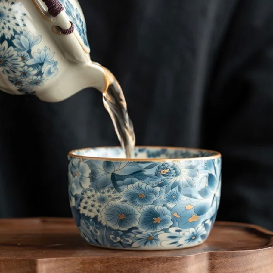 Tea pouring in the Blue Lotus Ceramic Tea Cup, Elegant Teaware