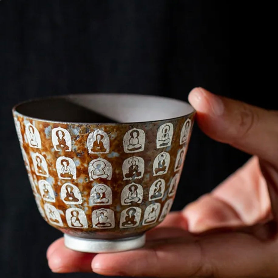 Chinese Buddha Ceramic Tea Cup – A finely crafted ceramic tea cup featuring a serene Buddha design, perfect for adding a touch of tranquility to your tea time.