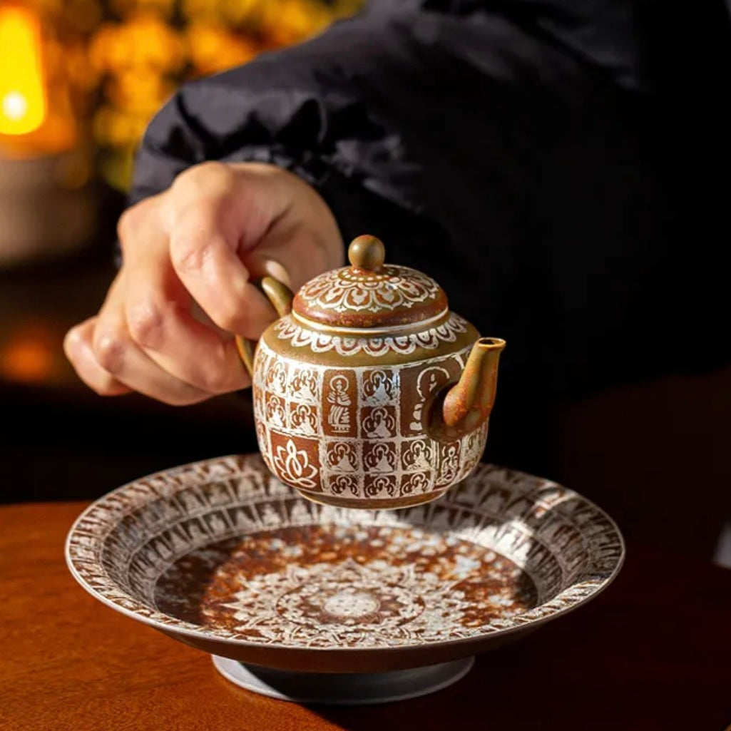 Traditional Chinese Buddha Ceramics Tea Pot. A beautifully crafted ceramic tea pot featuring a Buddha design, perfect for a calming tea experience with a touch of traditional Chinese artistry.