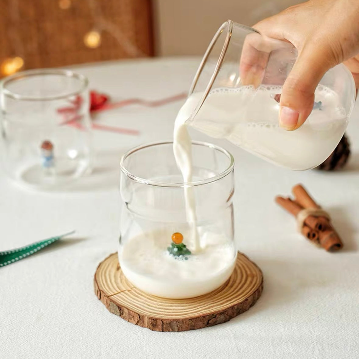 Christmas-Themed Glass Cups with milk