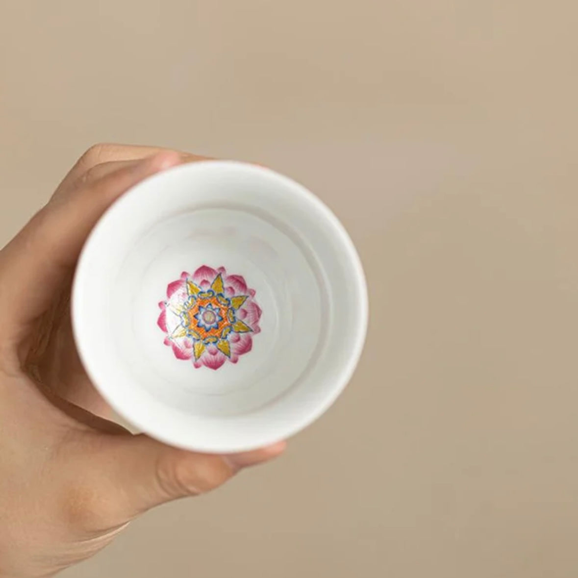Colorful Chinese traditional ceramic tea cup with vibrant patterns and elegant design, ideal for tea lovers and cultural enthusiasts.