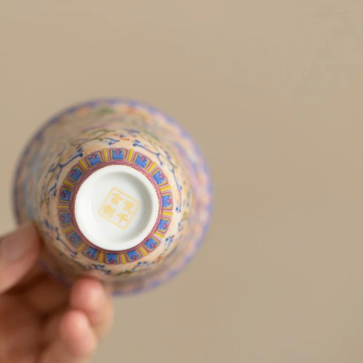 Colorful Chinese traditional ceramic tea cup with vibrant patterns and elegant design, ideal for tea lovers and cultural enthusiasts.