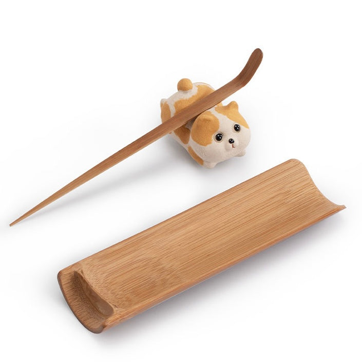 Handcrafted Corgi dog tea pet made from Yixing purple clay, ideal for tea ceremonies and traditional teaware collections.