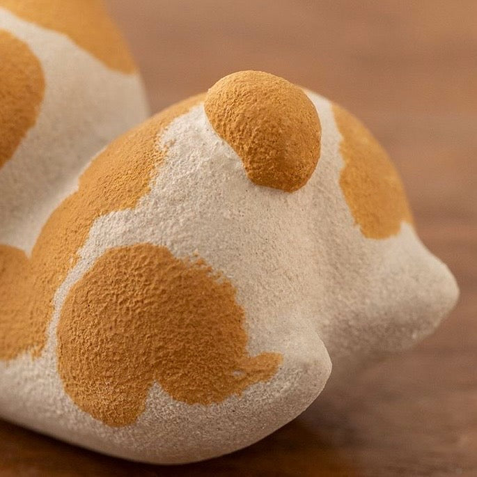Handcrafted Corgi dog tea pet made from Yixing purple clay, ideal for tea ceremonies and traditional teaware collections.
