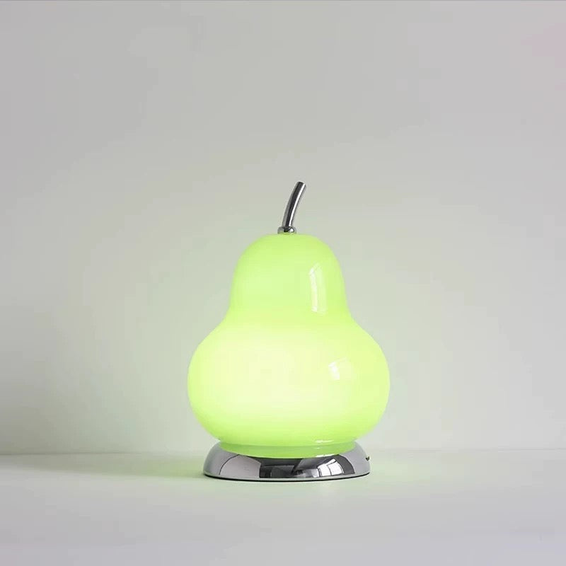 Green pear-shaped cordless rechargeable glass table lamp with sleek and modern design, ideal for portable lighting in home or outdoor settings.