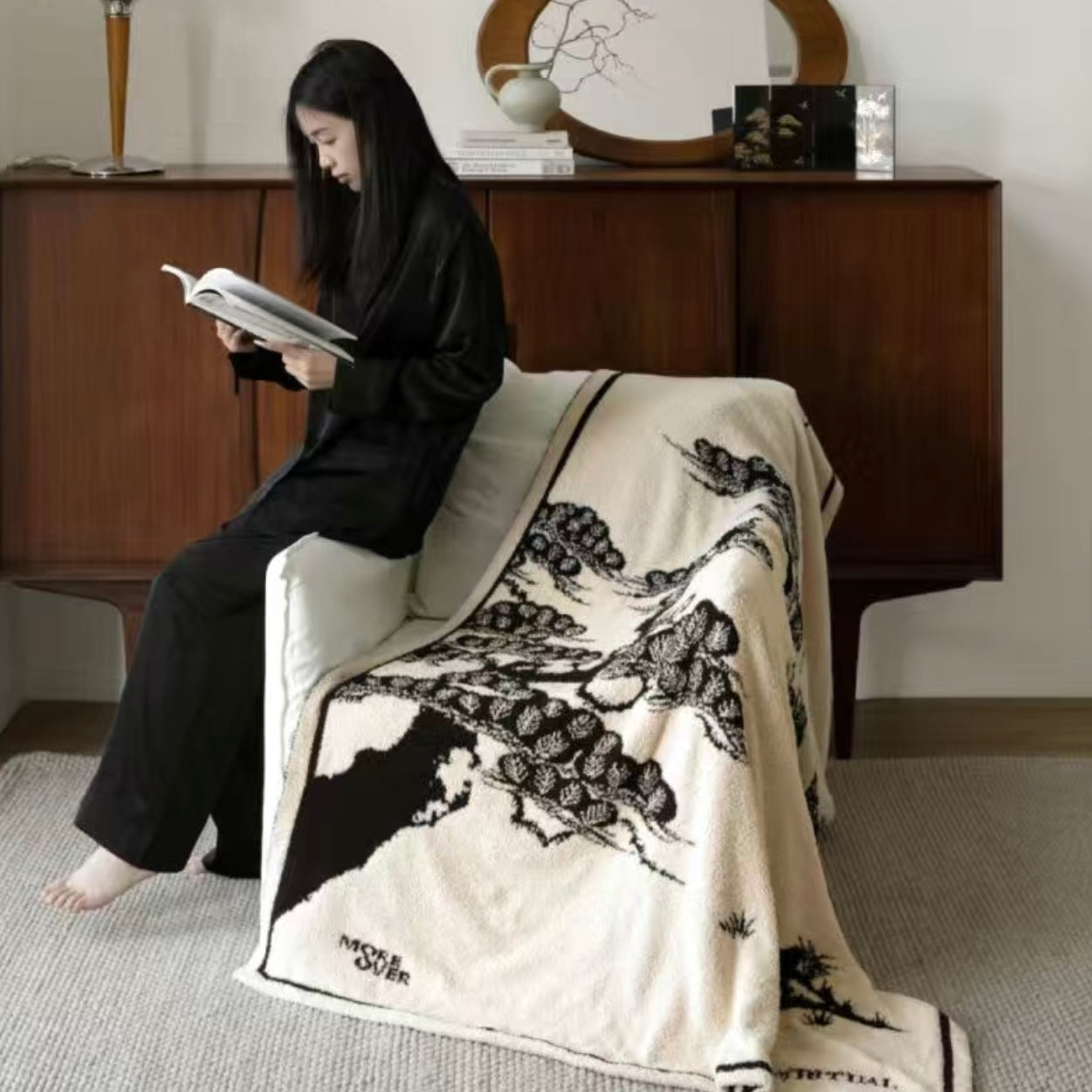 Japanese Style Pine Tree Throw Blanket,  a woman next to blanket reading book