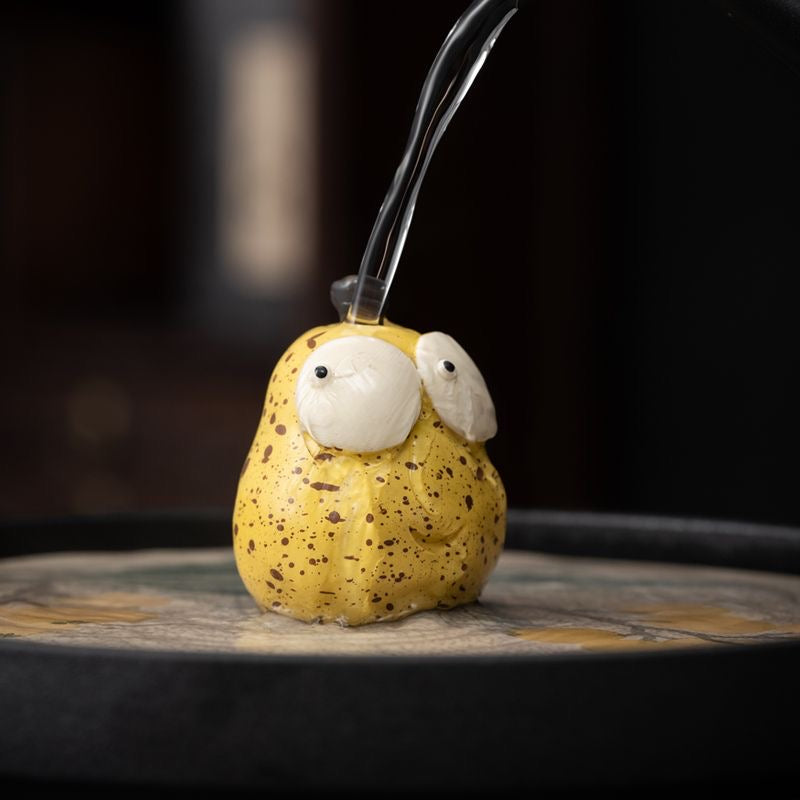 Pear Yixing Tea Pet. A beautifully crafted pear-shaped Yixing tea pet, perfect for enhancing your tea ceremony and bringing harmony to your tea rituals.