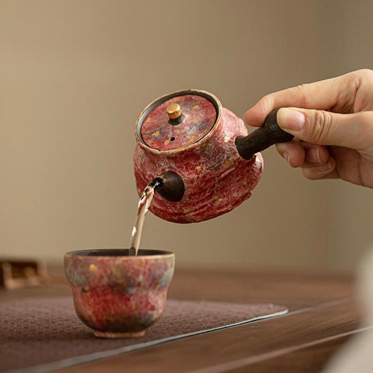 Pink Rock Mine Pottery Teapot pour tea in the tea cup, Artisan Ceramic