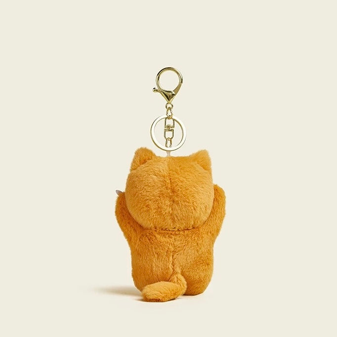 Plush Cat Keychain / Bag Charm – A cute plush cat keychain that doubles as a stylish bag charm, perfect for adding personality to your accessories.