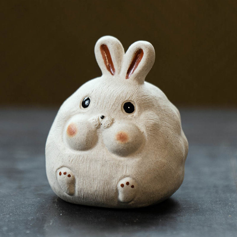 Rabbit Yixing Purple Clay Tea Pet. A cute rabbit-shaped Yixing tea pet, crafted from purple clay, adding a touch of luck and elegance to your tea experience.