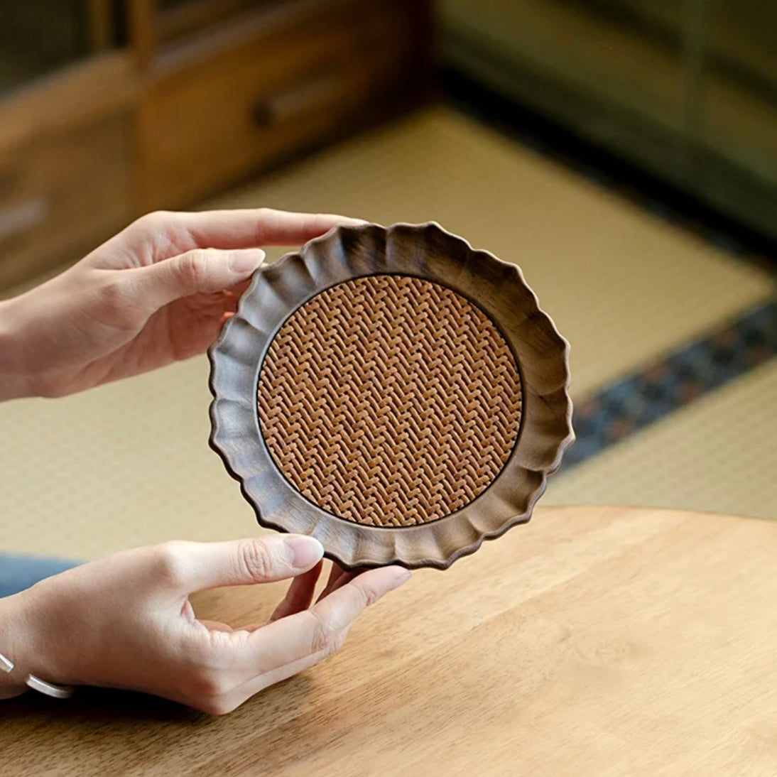 Walnut Wood and Rattan Coaster Plate. A beautifully crafted coaster and plate made from walnut wood and rattan, perfect for elevating your home decor and protecting your furniture.