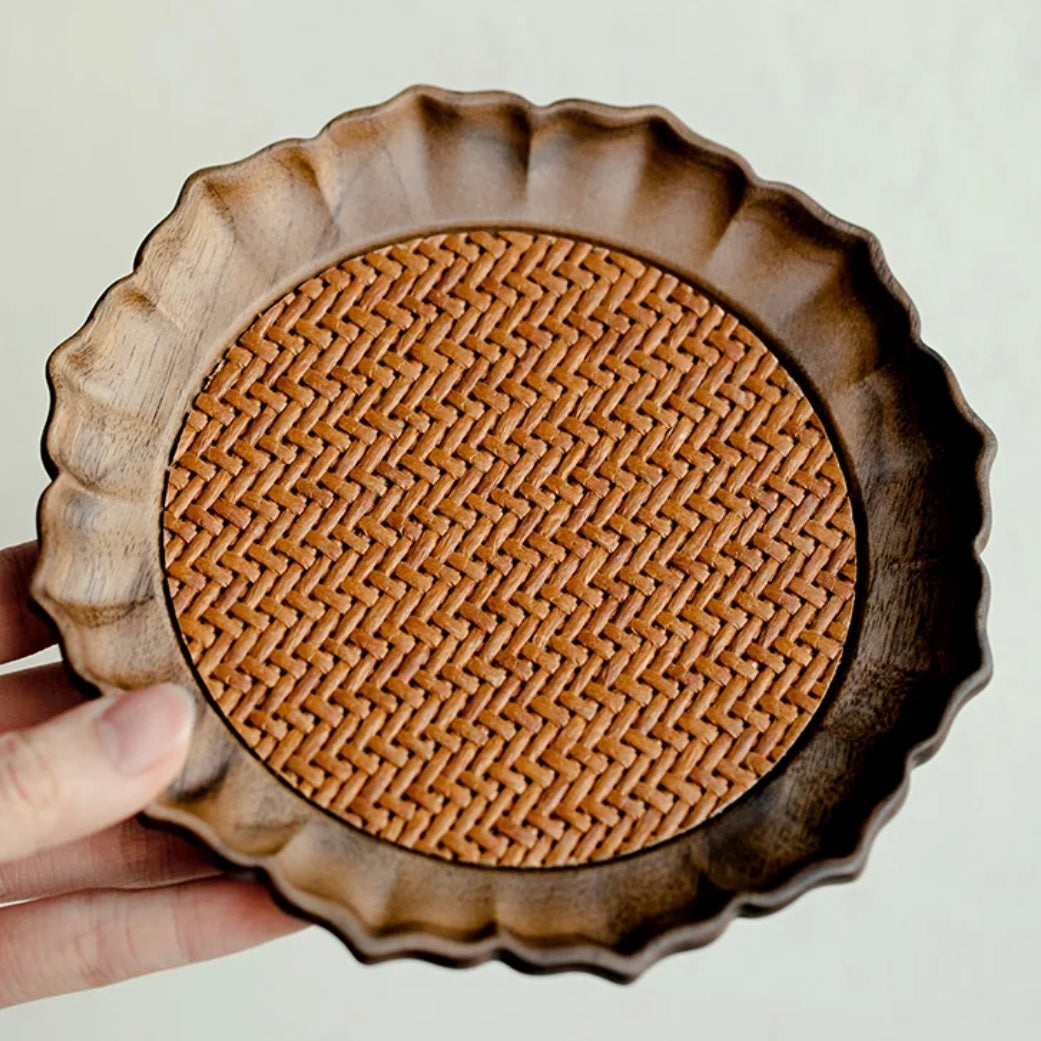 Walnut Wood and Rattan Coaster Plate. A beautifully crafted coaster and plate made from walnut wood and rattan, perfect for elevating your home decor and protecting your furniture.