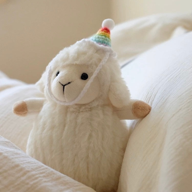 White Sheep Plush Wool Stuffed Toy, A soft and fluffy plush sheep toy made from high-quality wool, perfect for gifting, cuddling, or decorating with its charming appearance.