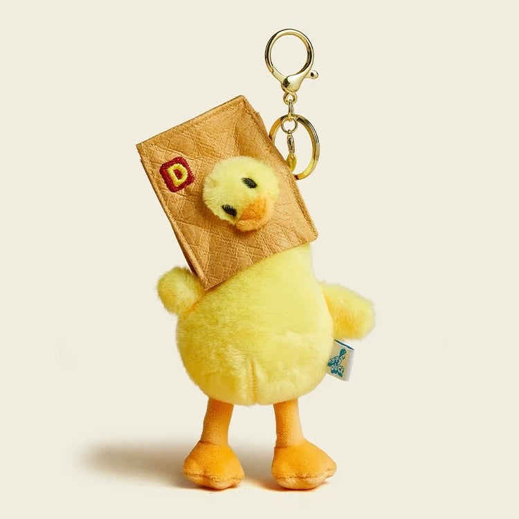 Yellow Plush Duck Keychain / Bag Charm – A soft and fluffy yellow duck keychain, perfect for adding a fun and cozy touch to your bag or keys.