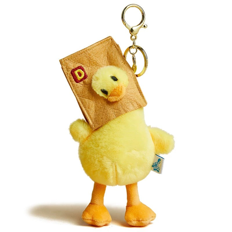 Yellow Plush Duck Keychain / Bag Charm – A soft and fluffy yellow duck keychain, perfect for adding a fun and cozy touch to your bag or keys.